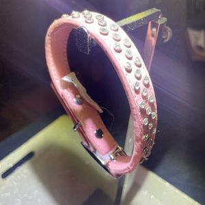 Leather Doggy collar with 50 rhinestones silver buckle that’s adjustable.